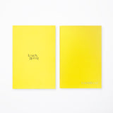 Stack of LEMONBOTTLE Yellow Note notebooks